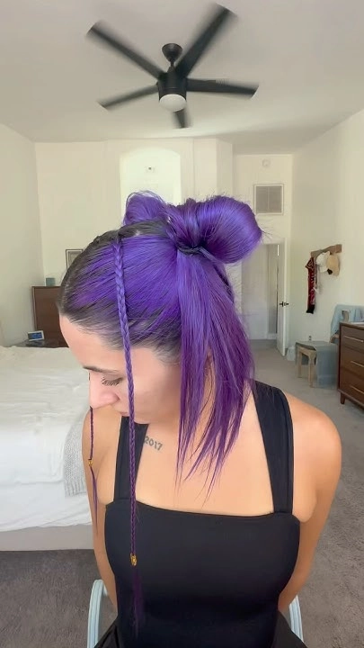 Y2K inspired space bun prom hairstyles featuring creative double buns and sleek finish