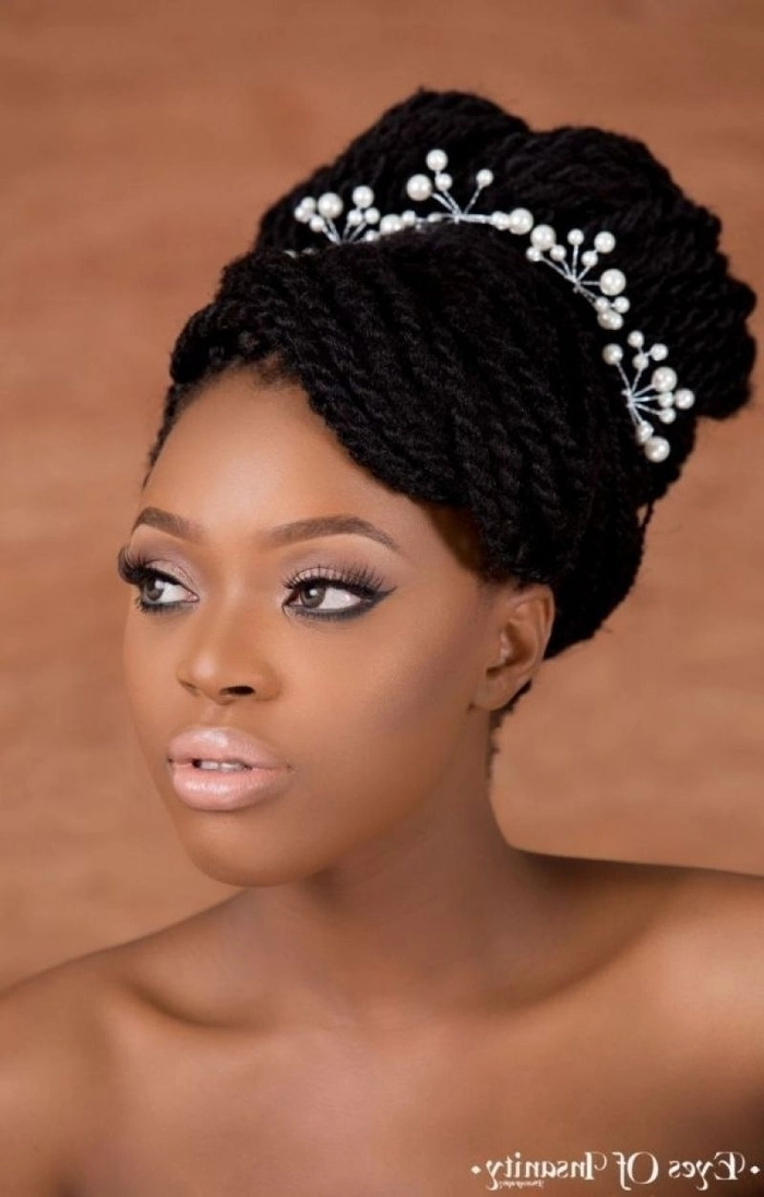 Elegant African bridal hair braided style with intricate patterns