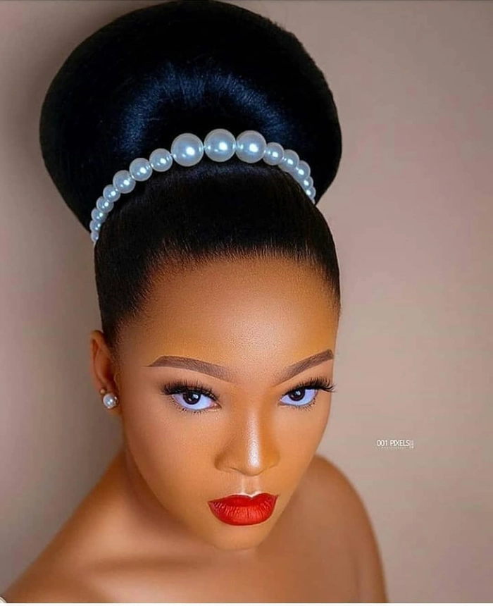 Elegant African bridal hair braided styles with intricate patterns and accessories