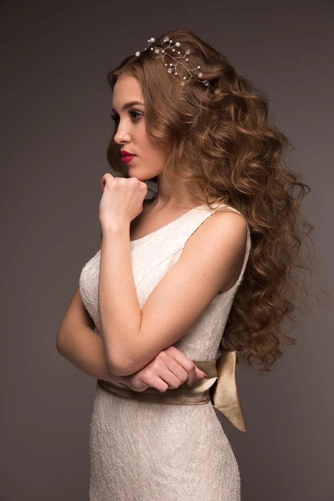 Bridal hairstyle featuring big hair wedding styles with volume and elegant waves
