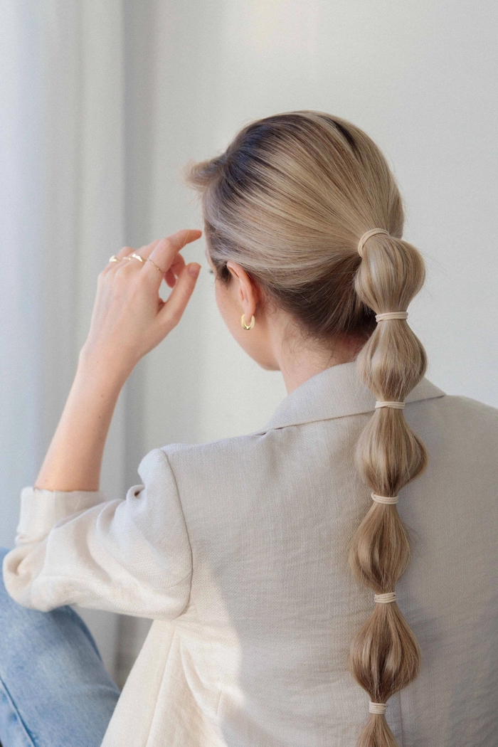 Elegant bridal hair bubble ponytail styled for a wedding day