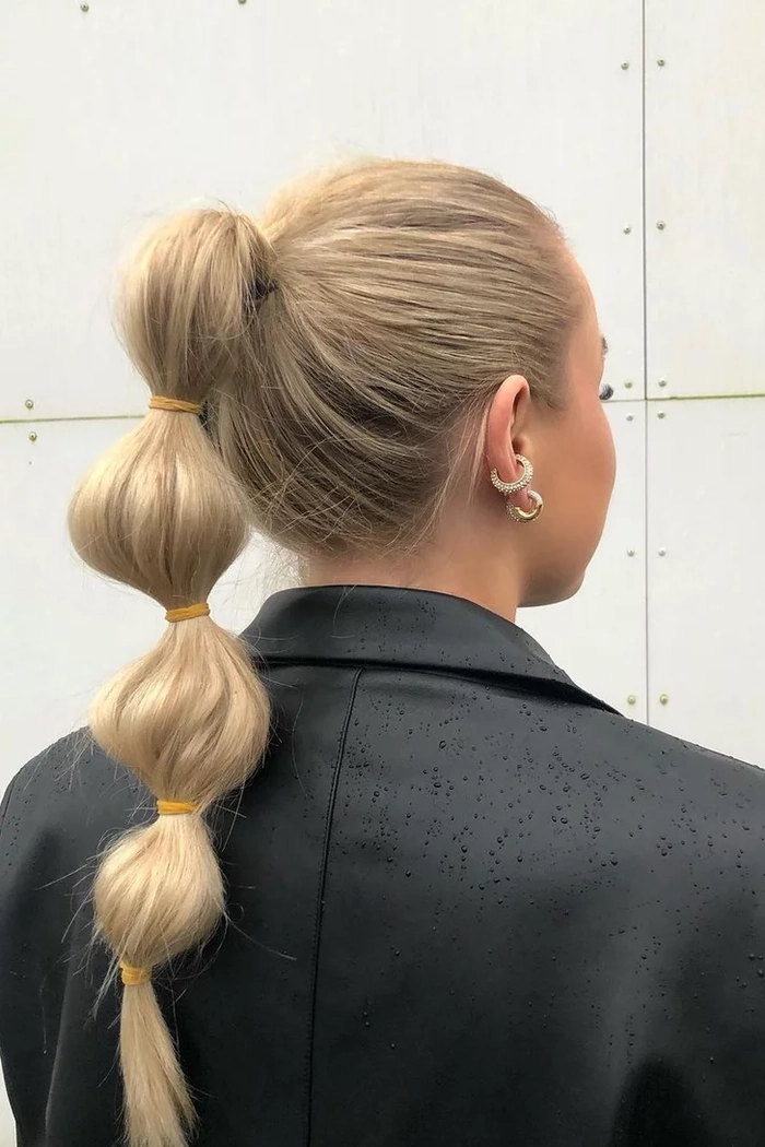 Elegant bridal hair bubble ponytail styled for a wedding day