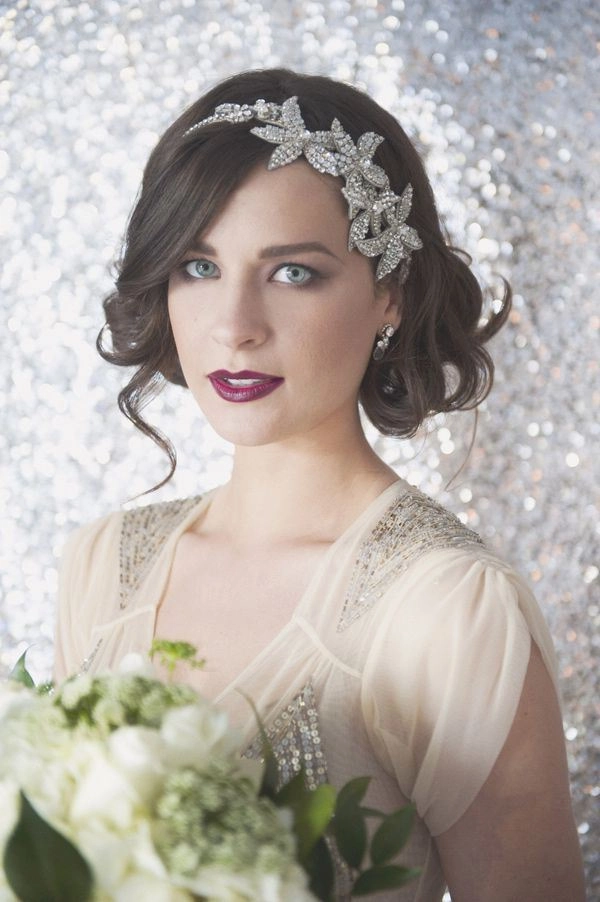 Bridal hairstyle inspired by the disco era with voluminous curls and sparkle