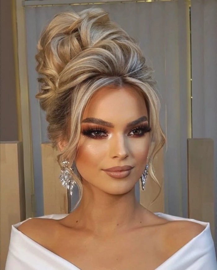 Elegant wedding hair design tailored for thick coarse hair textures Bridal hairstyle for thick coarse hair featuring elegant curls and intricate braids