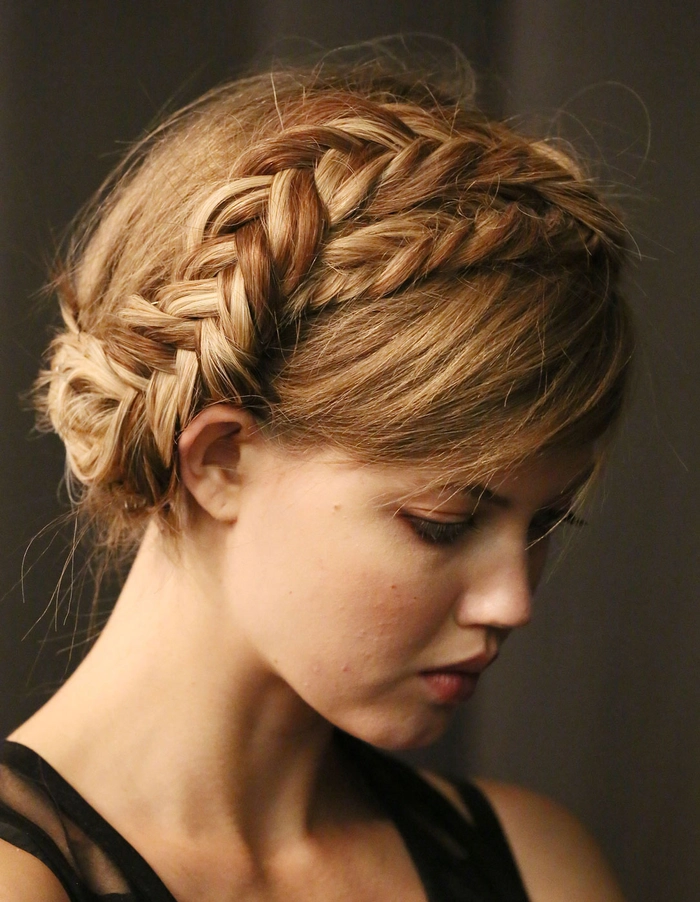 Elegant wedding hairstyle featuring bridal milkmaid braids, image 7 Bridal milkmaid braids elegantly styled for a wedding day look
