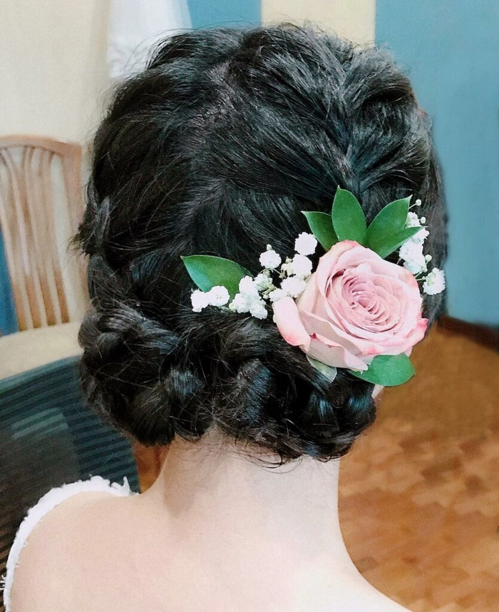 Beautiful wedding hairstyle featuring classic milkmaid braids for brides Elegant bridal milkmaid braids styled for a wedding day look