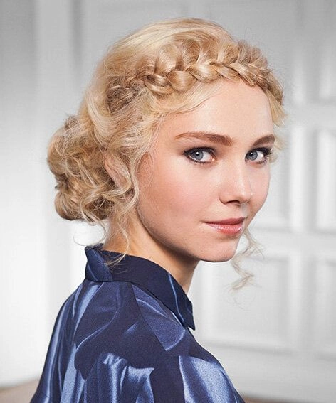 Bridal milkmaid braids wedding hairstyle inspiration image 2 Elegant bridal milkmaid braids styled for a wedding