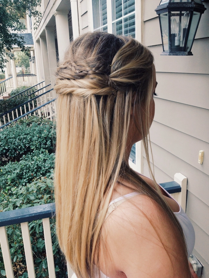 Bridal model showcasing long straight sleek bridal hair in a wedding hairstyle