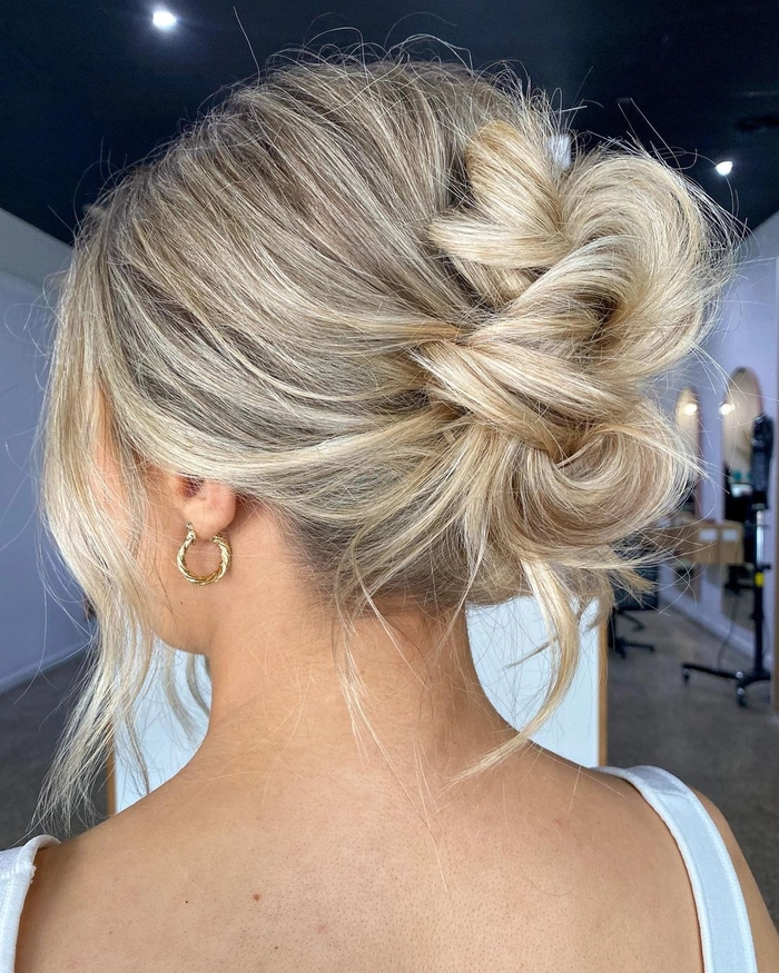 Fine thin hair bridal updos perfect for weddings and special occasions Elegant bridal updo for fine thin hair with delicate curls and floral accents
