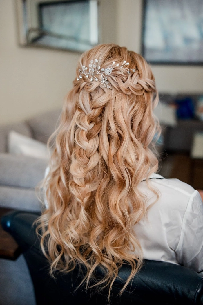 Bride showcasing elegant big hair wedding styles with voluminous curls