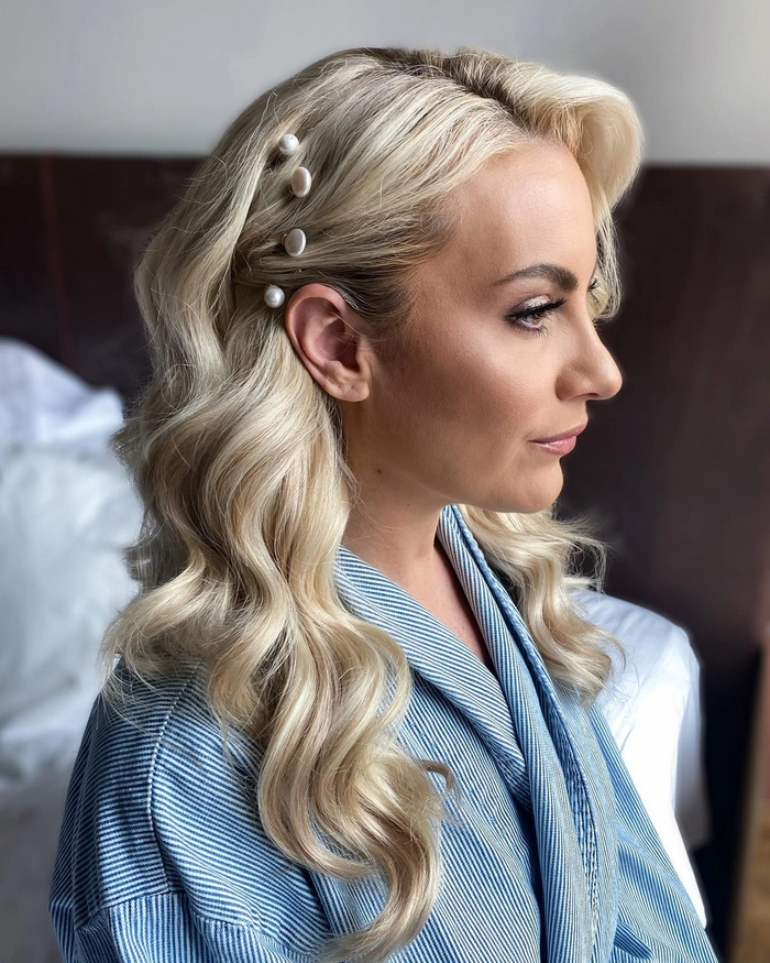 Elegant classic Hollywood waves bridal hairstyle perfect for wedding occasions Bride showcasing a classic Hollywood waves bridal look with elegant makeup