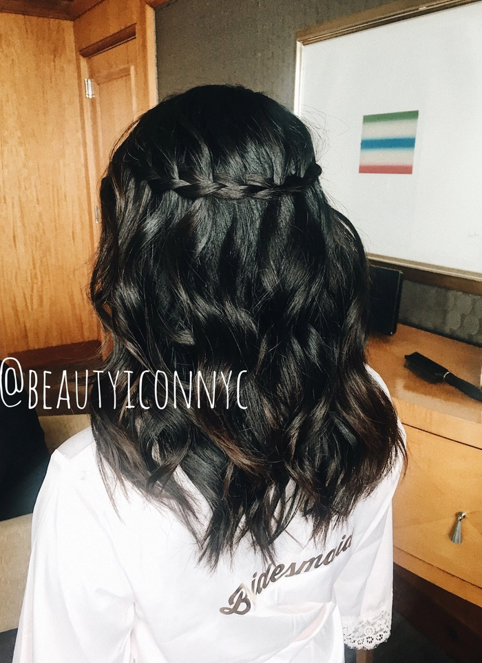 Stunning waterfall braid wedding hair for a beautiful bridal look Bride showcasing an elegant waterfall braid wedding hair hairstyle