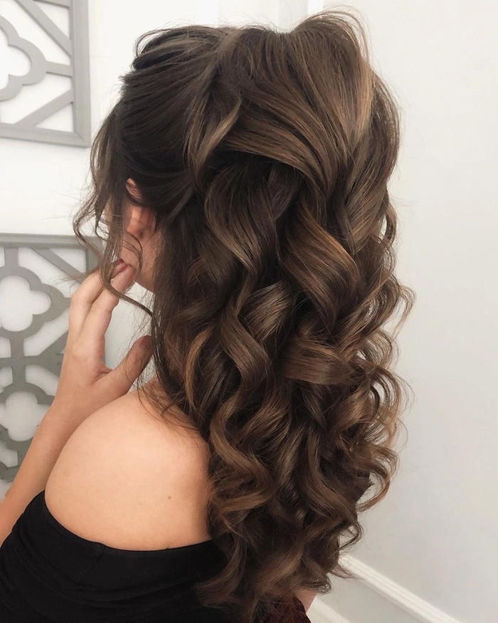 Bride with long straight sleek bridal hair styled elegantly for a wedding day