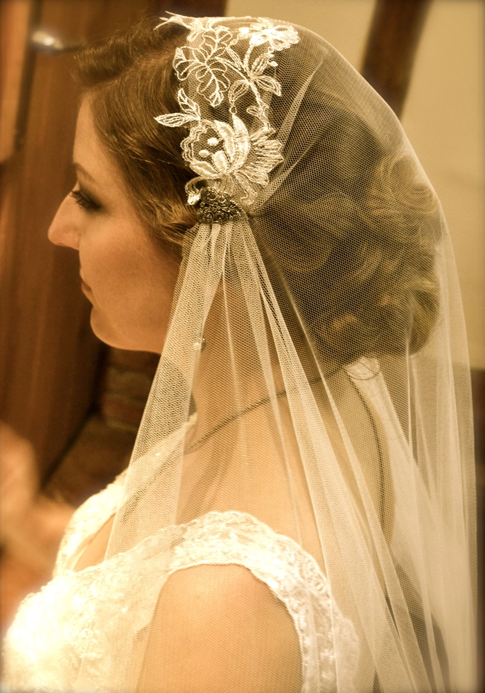 Bride showcasing vintage 1920s finger waves wedding hair in elegant style