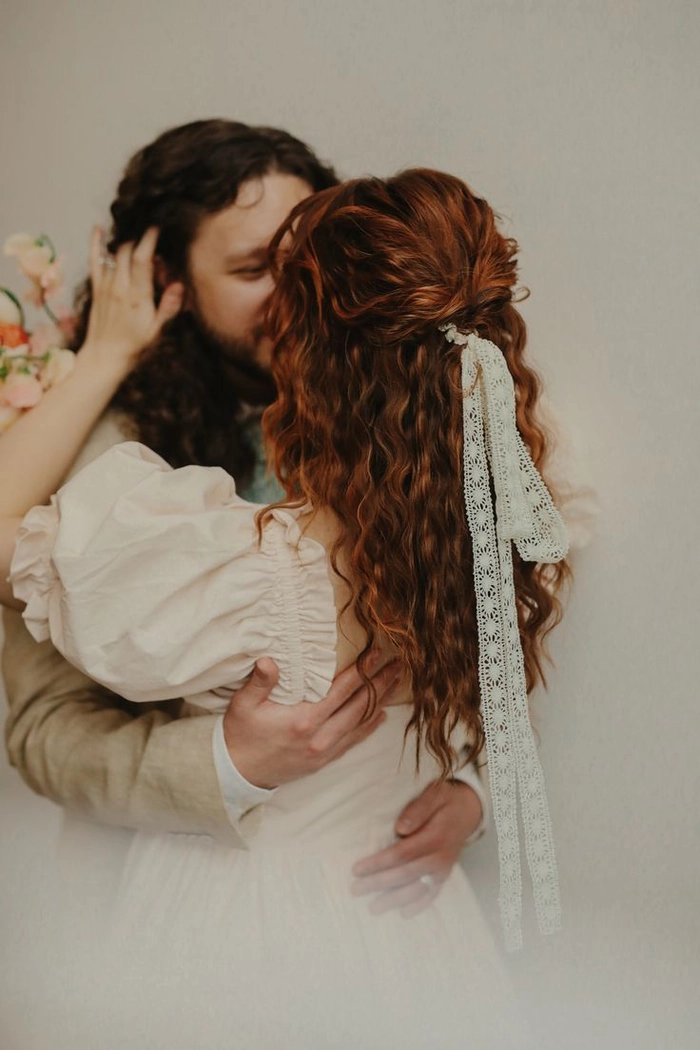 Cottagecore wedding hair styles featuring soft waves and floral accents