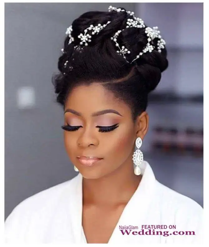 Elegant African bridal hair braided styles showcasing intricate patterns and adornments