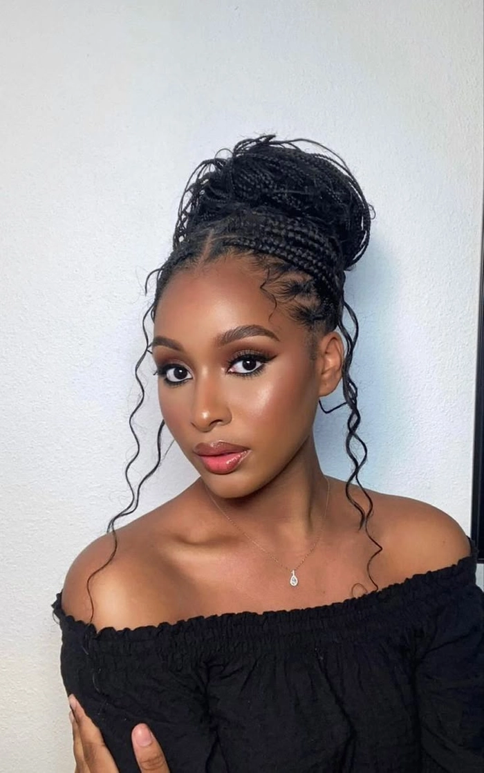 Elegant African bridal hair braided styles with intricate patterns and floral accents