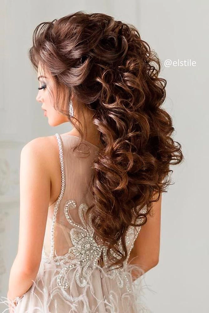 Elegant bride showcasing one of the best big hair wedding styles for a stunning look