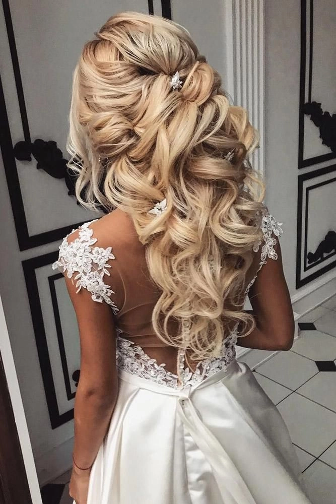 Elegant big hair wedding styles showcasing volume and intricate details