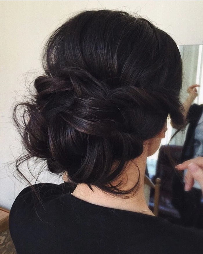 Sophisticated black tie wedding hairstyle perfect for formal ceremonies Elegant formal black tie wedding hair styled with classic waves and a sleek finish