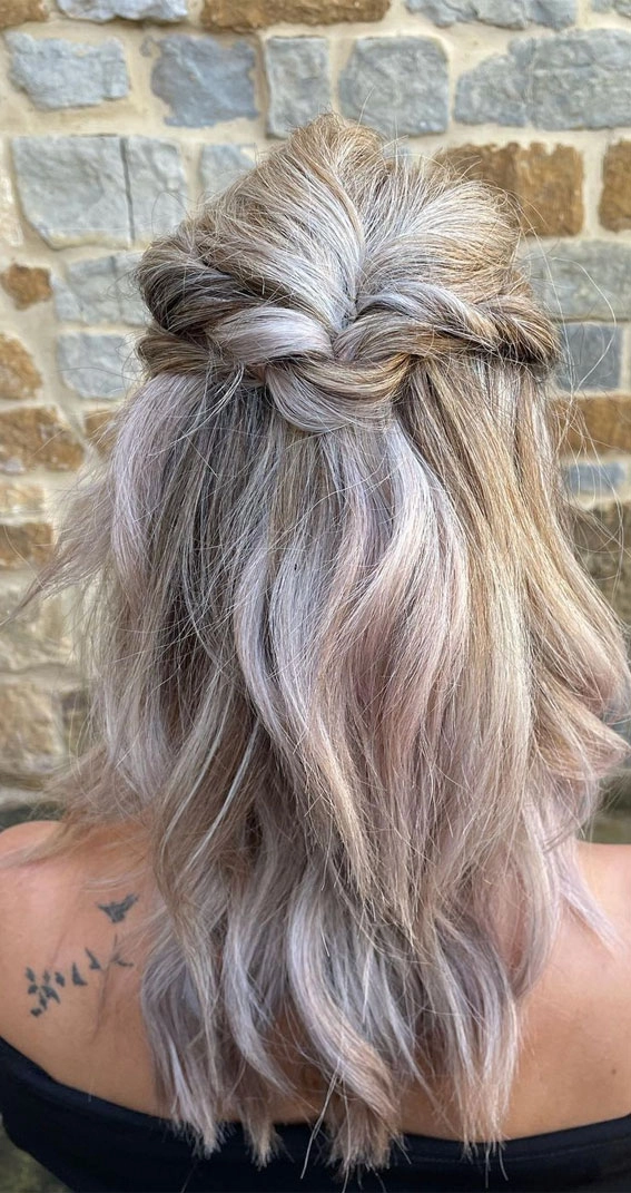 Elegant bridal hair for gray hair styled with soft curls and delicate accessories