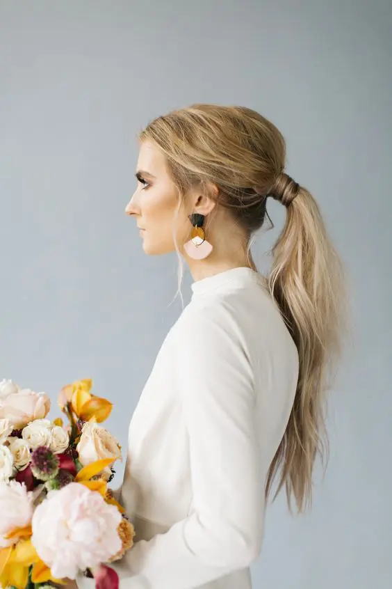 Sophisticated s minimalist bridal hair for modern weddings Elegant s minimalist bridal hair with delicate accessories