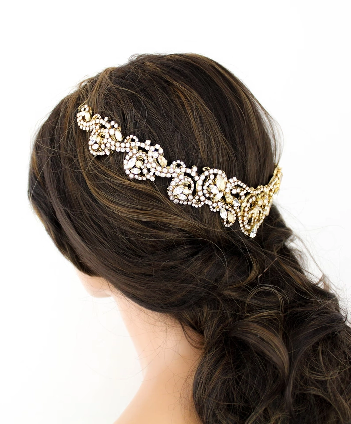Beautiful bridal hairstyle featuring a sparkling crystal tiara for a wedding Elegant wedding hair styled with a crystal tiara for a bride