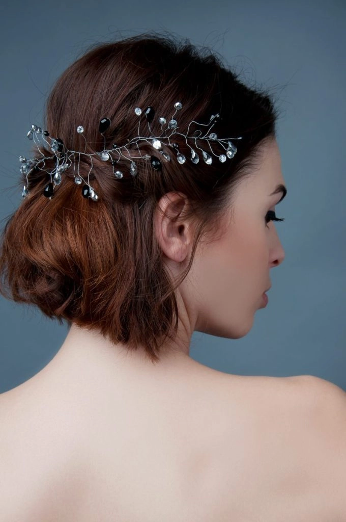 Elegant bridal hair styled perfectly with curtain bangs for a romantic wedding look