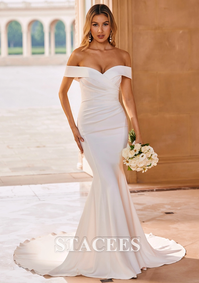 Elegant bridal hair styled to complement an off the shoulder wedding dress
