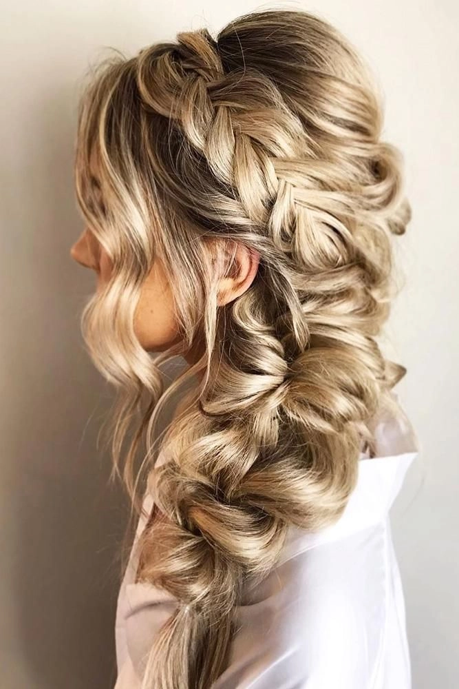 Beautiful wedding hairstyle featuring a side braid for brides Elegant bridal hair with side braid perfect for wedding day