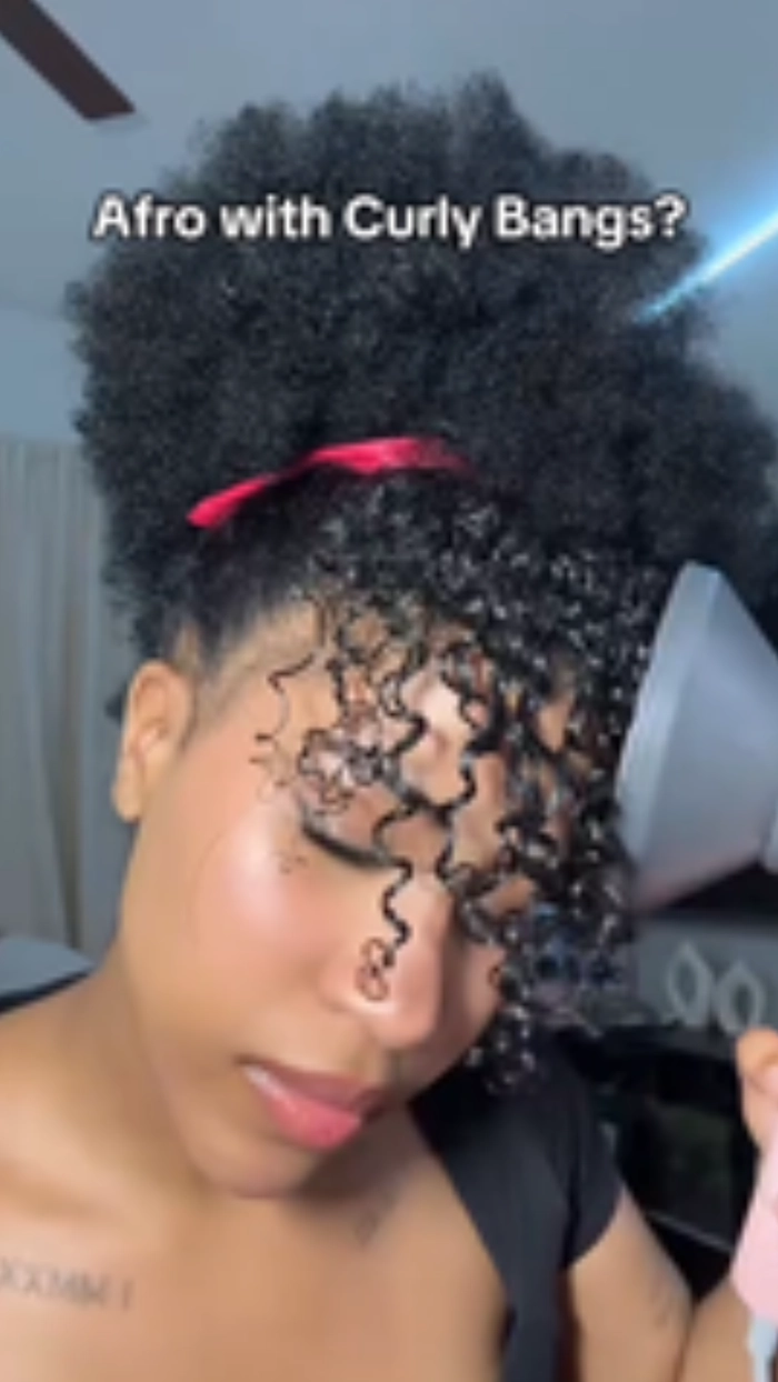 Elegant wedding hair with soft bangs styled for a bridal look