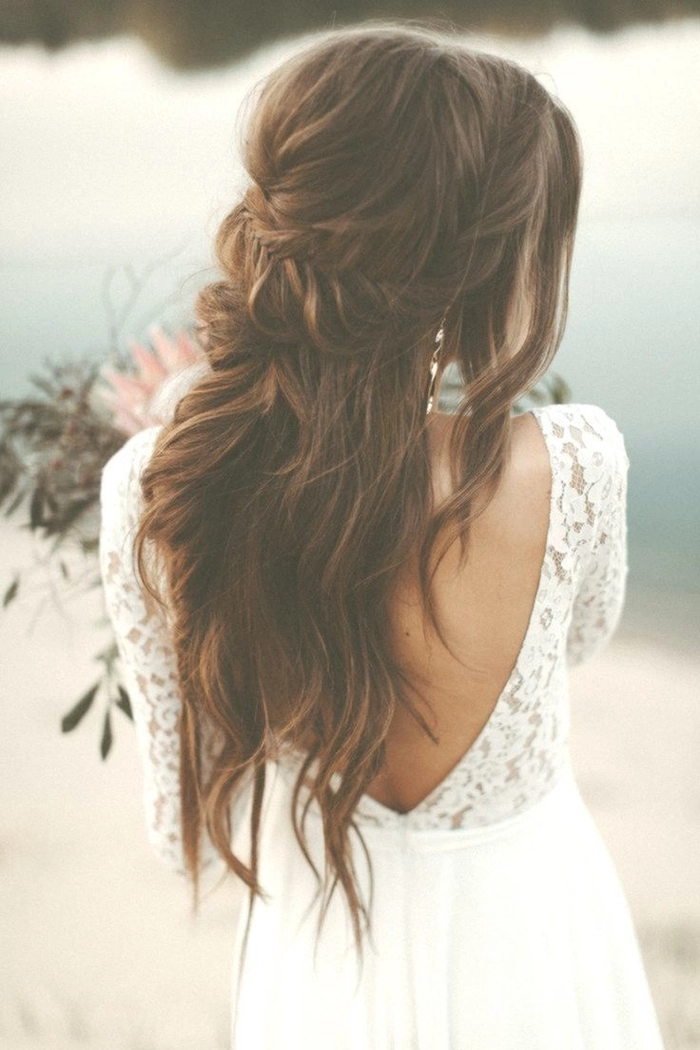 Chic and natural bridal hair design perfect for intimate wedding celebrations Elegant elopement bridal hair styles featuring soft waves and floral accents