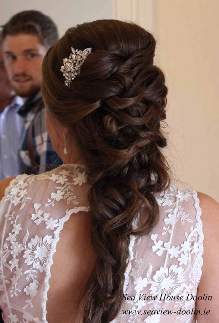 Romantic wedding hairstyles perfect for an intimate elopement ceremony Elegant elopement bridal hair styles featuring soft waves and floral accents