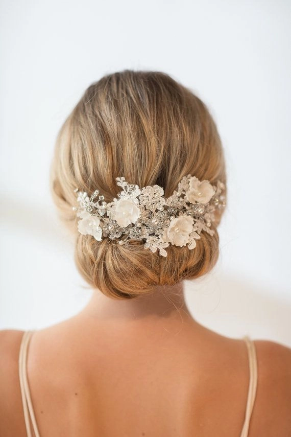 Elegant bridal hair styled with delicate hairpieces for a wedding