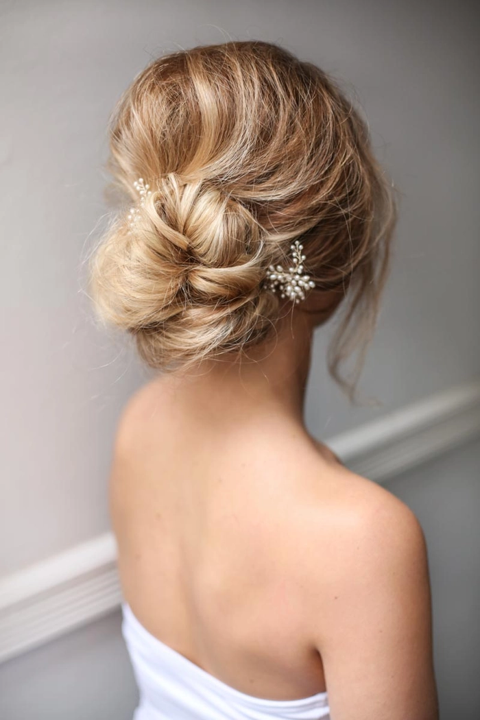 Elegant bridal hairstyle featuring delicate hairpieces for a romantic wedding look