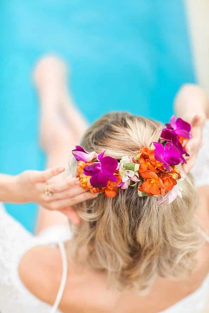 Romantic and stylish hair ideas for tropical destination weddings image 13 Elegant bridal hairstyle perfect for destination tropical wedding settings