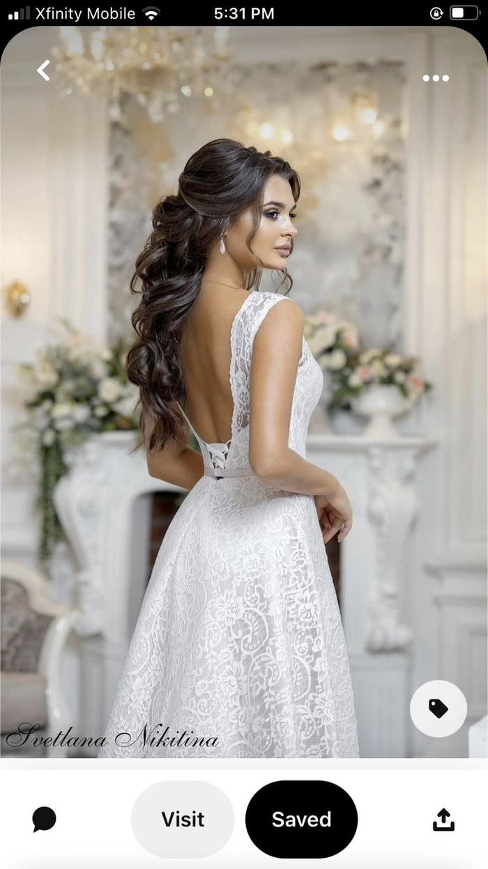 Chic hairstyle perfect for complementing backless wedding gowns Elegant bridal updo showcasing wedding hair for backless dress