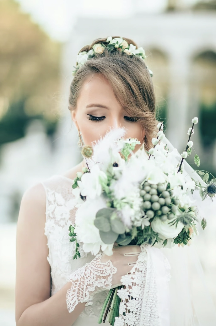 Elegant wedding hair with soft bangs styled for a bridal look