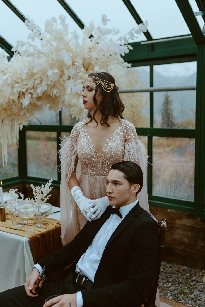 Elegant bride with great gatsby themed wedding hair featuring vintage waves and pearl accessories