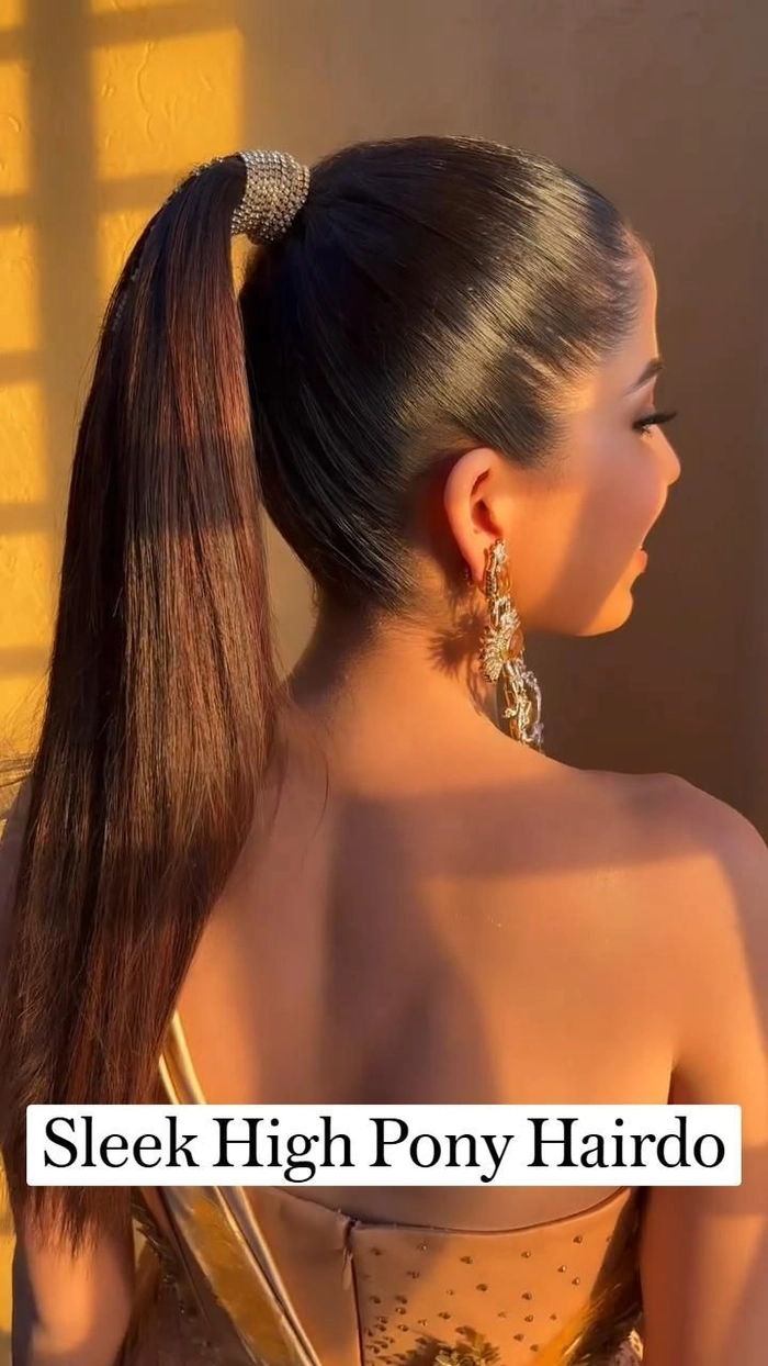 Chic and polished high ponytail wedding hairstyle perfect for the big day Elegant bride with a sleek high ponytail wedding hair styled for a formal event