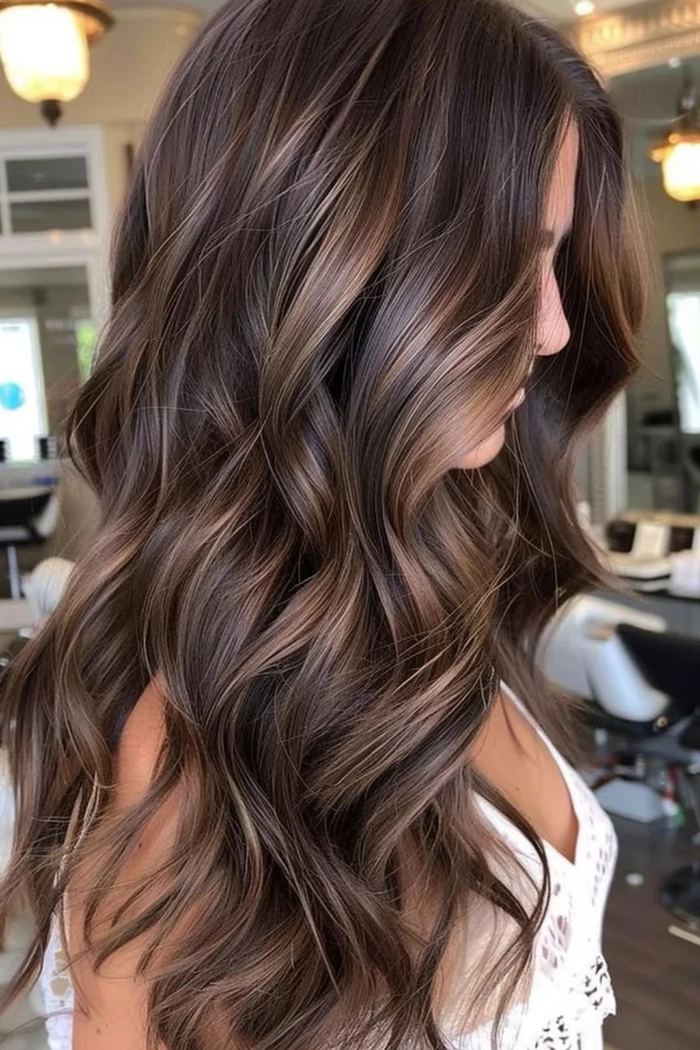 Brunette wedding hairstyle highlighting rich color and texture for special day Elegant wedding hairstyle showcasing brunette dimension with soft waves