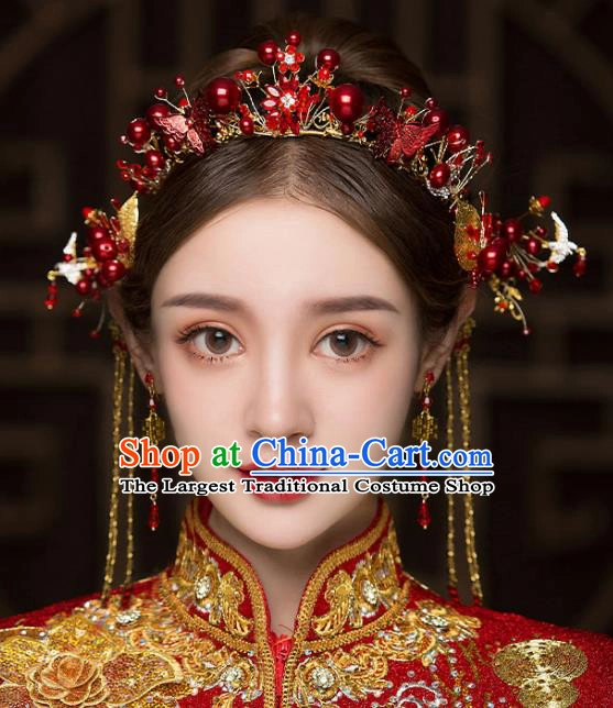 Elegant Chinese wedding hair with ornate hair sticks showcasing traditional style
