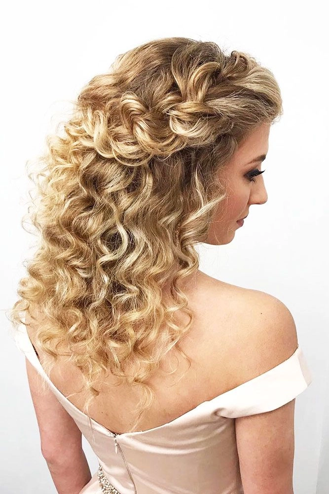 Stylish wedding hairstyle featuring medium curly hair for bridesperfectly styled for a special day Elegant medium length curly bridal hair look with delicate floral accessories