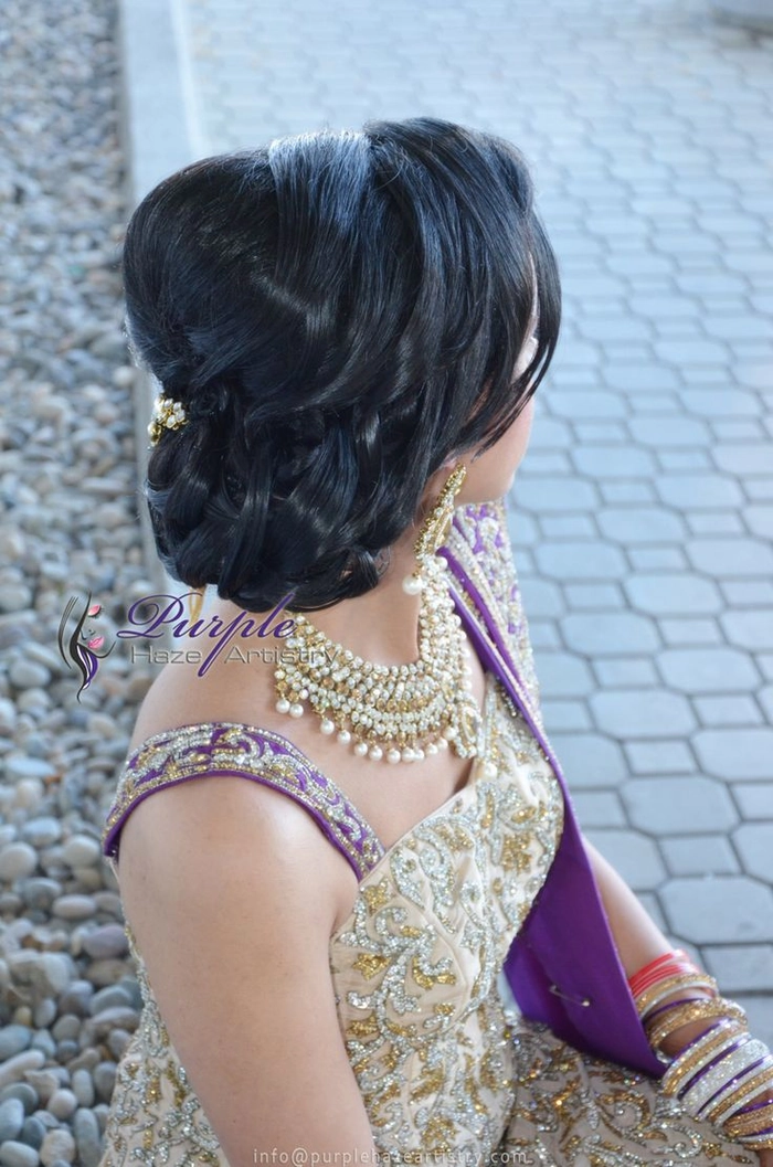 Elegant evening reception wedding hair changes featuring soft curls and delicate accessories