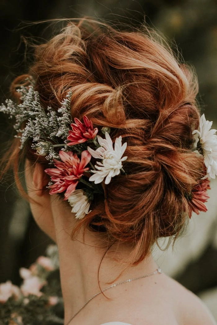Elegant fall autumn wedding hair styled with leaves intertwined for a romantic look