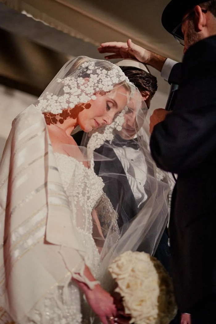 Elegant Jewish wedding hair styled with a delicate veil for a traditional look