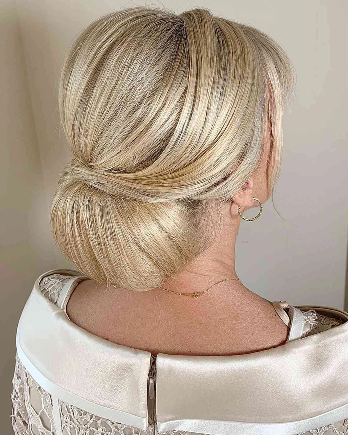 Elegant mother of the bride hairstyle showcasing volume for thin hair