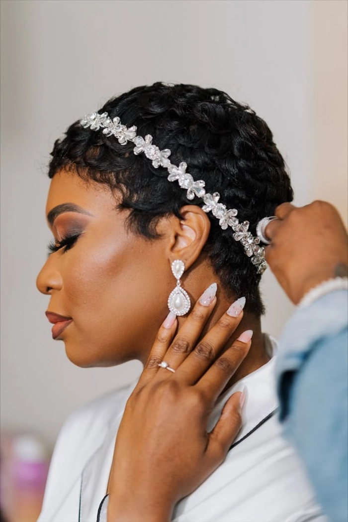 Pixie cut wedding hair accessories for a chic bridal look Elegant pixie cut wedding hair adorned with delicate floral accessories