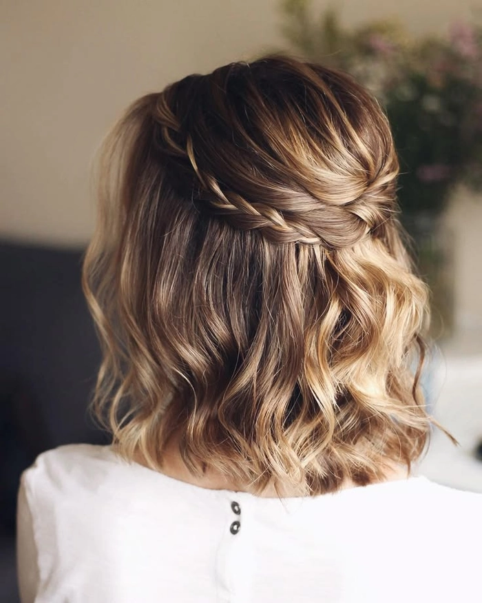 Chic and timeless short bob wedding hairstyle perfect for modern brides Elegant short bob wedding hairstyle adorned with delicate floral accessories for brides