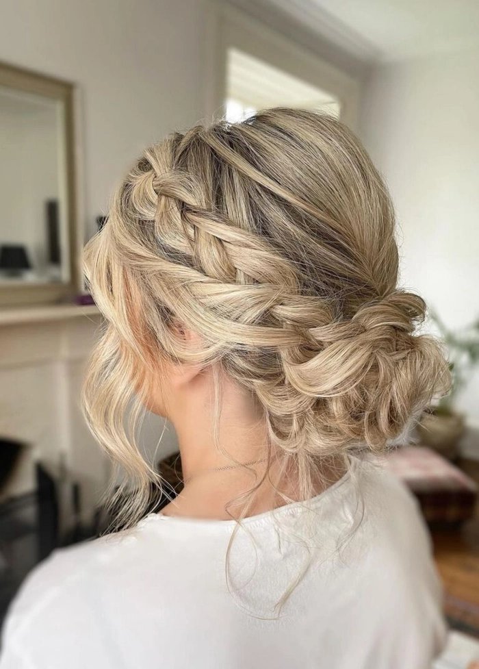 Chic and modern short hair updo perfect for bridesmaids at weddings Elegant short hair bridesmaid updo with soft curls and floral accessories